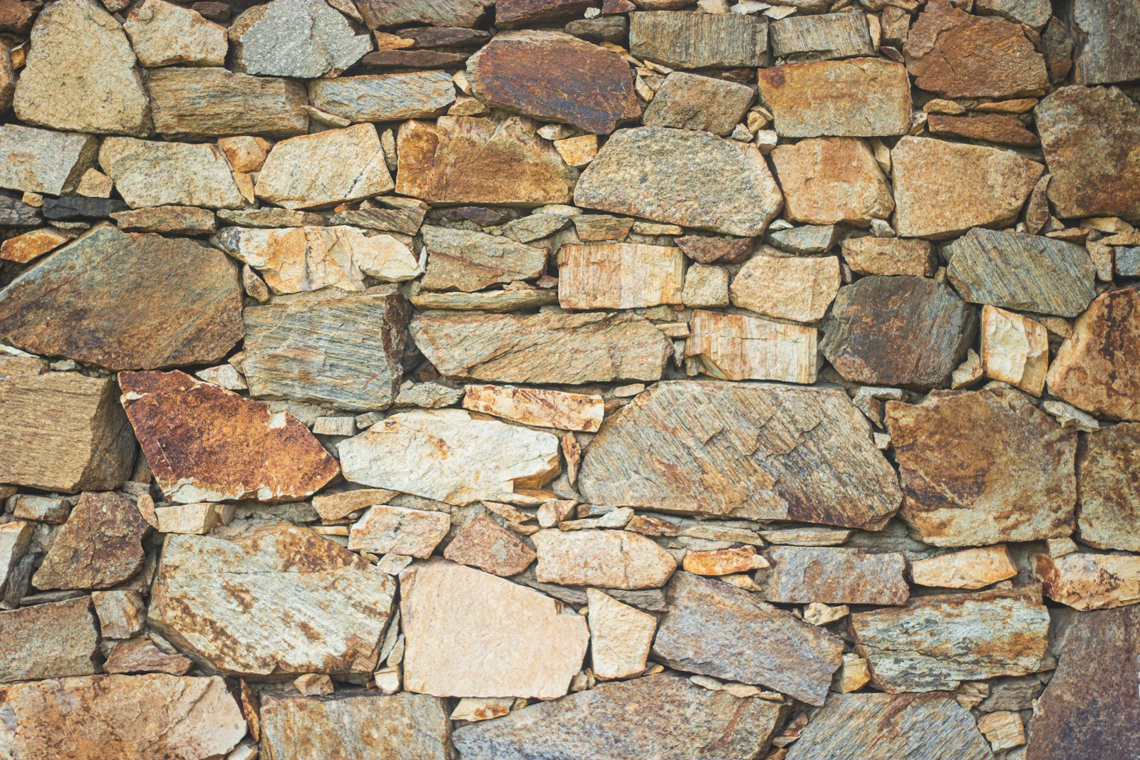 brown and gray brick wall